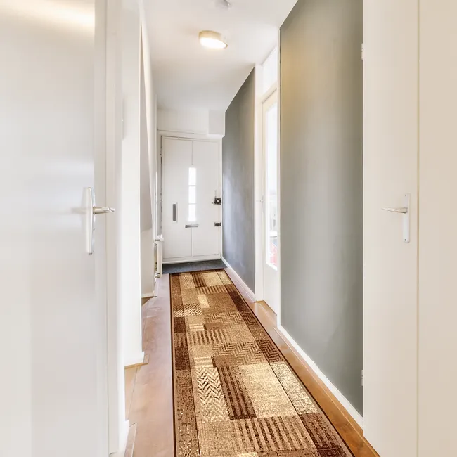 Chodnik dywanowy na mb Essenza brązowy szer. 120 cm