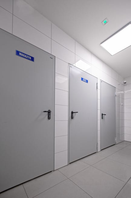 Drzwi przeciwpożarowe wewnętrzne EI30 szare RAL 7035 100 lewe Wiśniowski
