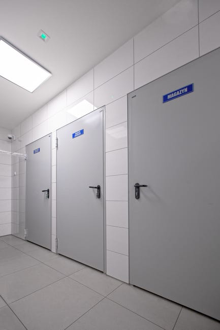 Drzwi przeciwpożarowe wewnętrzne EI60 szare RAL 7035 100 lewe Wiśniowski